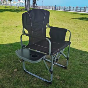 A folding chair with an attached table on top of it.