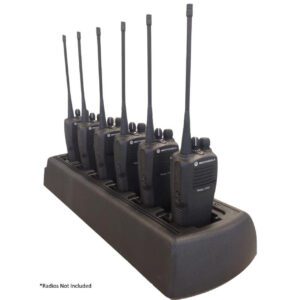 A group of walkie talkies sitting on top of a stand.